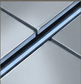 The same precise X seam, lit faintly blue from inside.